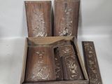 four wooden boxes that are sitting on a table