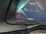 a car dashboard with a digital display on it