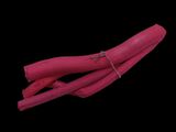 two pieces of red wood on a black background