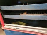 an image of a machine that has a bunch of metal items in it