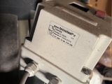 a close up of a box with wires attached to it