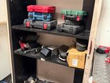 many tools on the shelves in the room