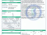 a green and white document with a barcode on it