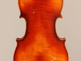 an old violin with a wooden back and bow on a white background