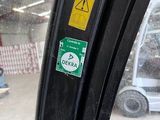 a picture of a bus window with stickers on it