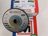 three different types of grinding wheels are on a table