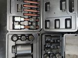 a lot of tools in the case on the table