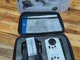 a box with a remote control inside of it on a table