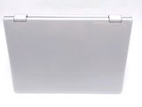 a close up of a laptop computer on a white surface