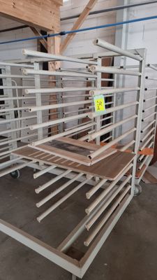 many shelves that are in the middle of a room