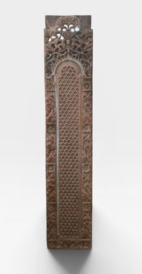 an old wooden door with carvings and carvings on it