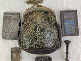 a lot of antique items that are on a table
