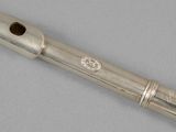 a close up of a metal pipe with a hole in it