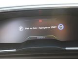 the dashboard of a car with a digital display on it ' s dashboard