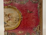 an old book with a picture of a woman and a bird on it