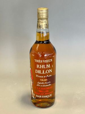 a bottle of whiskey that is sitting on a table