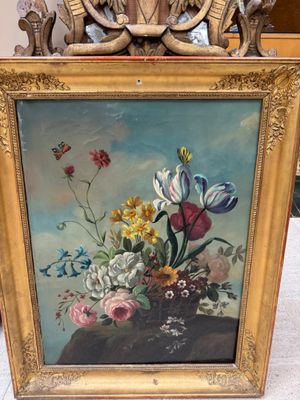 a picture of a painting of flowers in a gold frame