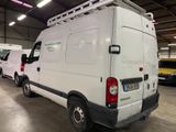 a white van that is parked in a garage