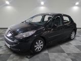 a picture of a black car parked in a garage