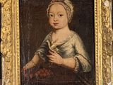 portrait of a young woman with a bird in a gold frame