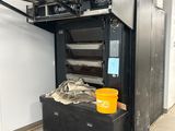 une image représentant une machine contenant tout un tas d'objets