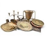 a lot of antique items that are sitting on the table