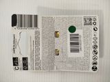 the back of a box with a green button on top of it
