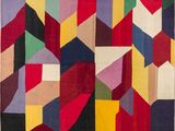 an image of a multicolored rug with squares of different colors