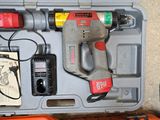 a tool in a toolbox with a hammer and other tools