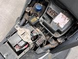 a motorcycle that has a bunch of electrical parts in it