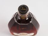 a bottle of liquor that is sitting on a table