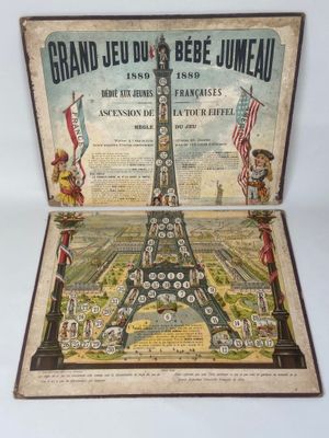 an old book with a picture of the eiffel tower on it