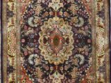 a black and red rug with a medallion design on it
