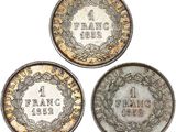 three coins with the names of france and france on them