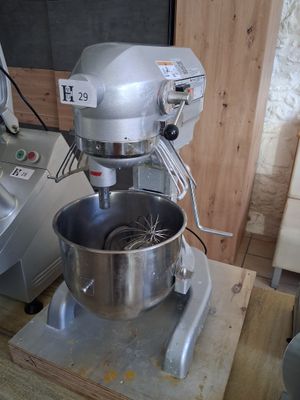an image of a mixer on a table in a kitchen