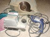 a lot of tools that are sitting on the floor