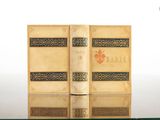 a book that is sitting on a glass table