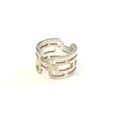 silver ring with inter links on a white background