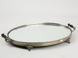 an image of a silver tray with a mirror on top of it