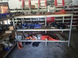 a garage with a lot of tools on the shelves