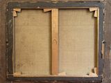 an old picture frame with a piece of wood sticking out of it
