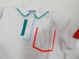 white polo shirt with red, blue, green, and white stripes