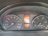 a close up of a car dashboard with a speedometer and other gauges