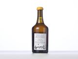 a bottle of wine that is sitting on a table