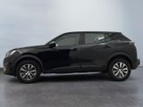 the black suv is parked on the concrete floor in the room