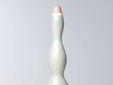 un vase blanc aux bords roses posé sur une table