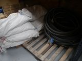 a pile of bags of garbage in the back of a truck