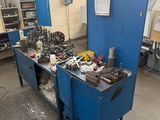 a picture of a workbench in a factory with tools on it