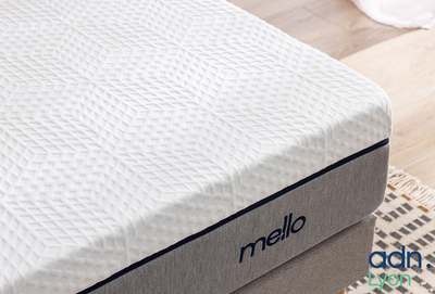 a close up of a mattress on a wooden floor