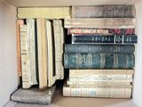 a box full of books sitting on the floor